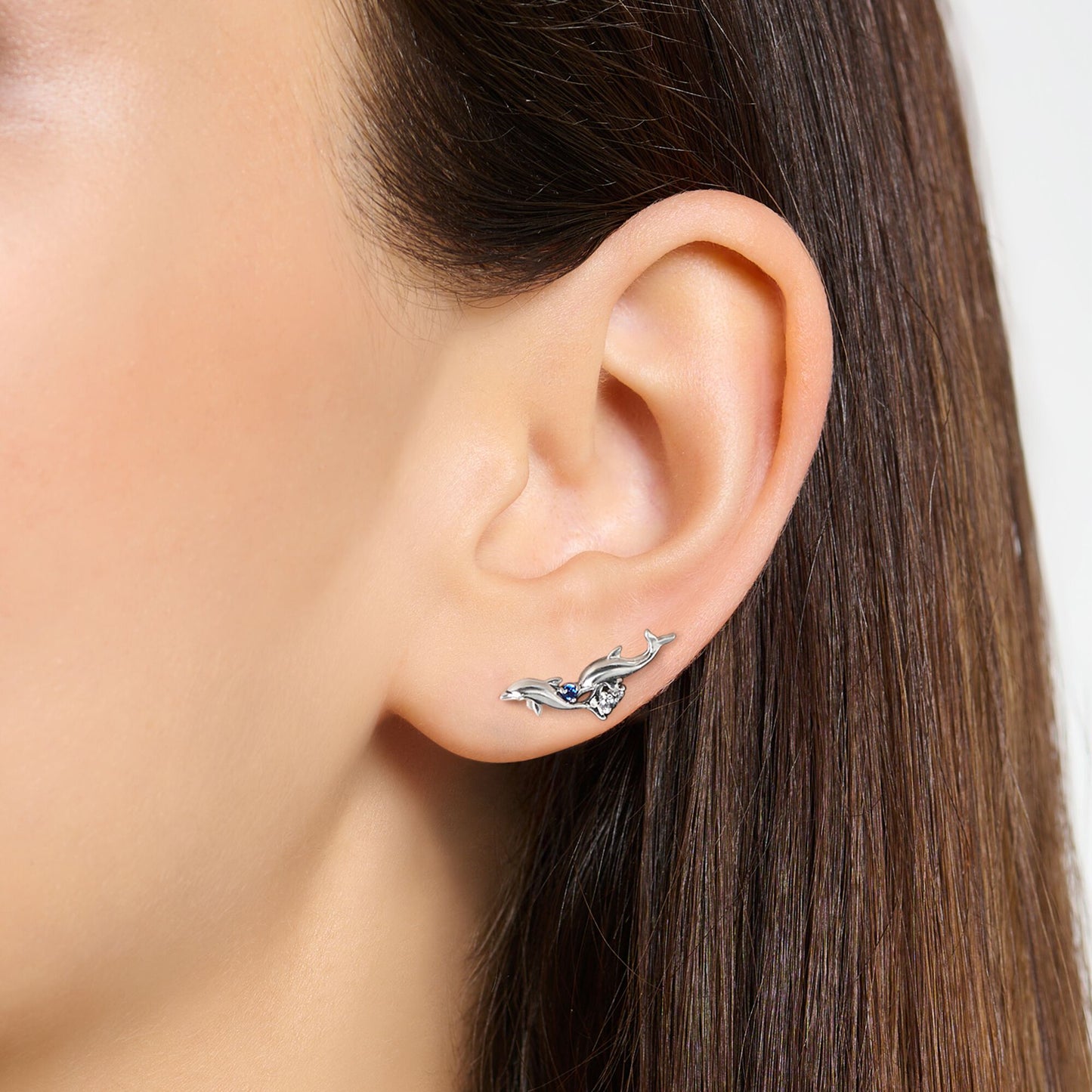 Ear climber dolphins with blue stones H2232-644-1
